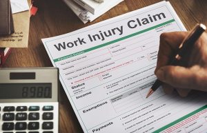 Work injury compensation claim form concept